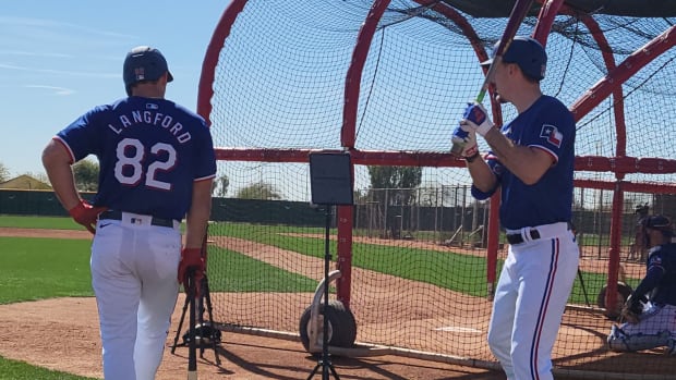 Texas Rangers top prospects, Evan Carter, right, and Wyatt Langford, are both leading contenders to win the American League Rookie of the Year award in 2024, according to oddsmakers.